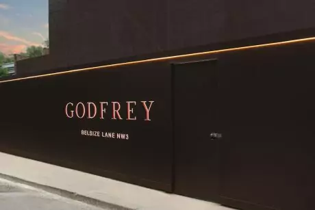 Dibond hoarding graphics with bespoke vinyl face and push through illuminated developer logo