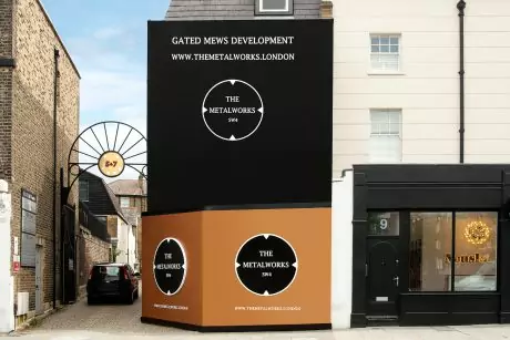 Low level 3m high hoarding design with printed building wrap situated above