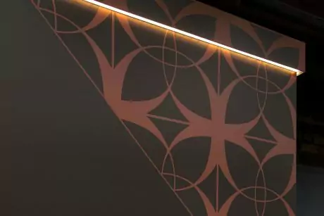 Hidden LED hoarding trim with bespoke metallic vinyl overlay