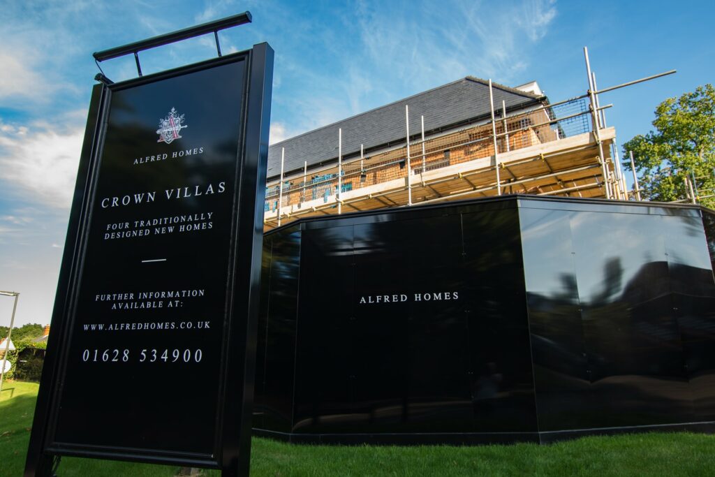 Large v shape monolith sign with illuminated tough light feature