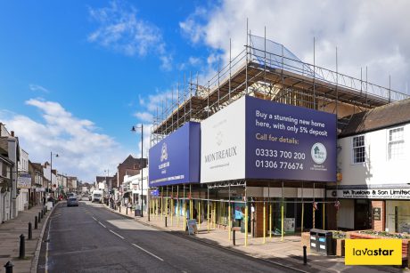 Wide format printed building banner in Dorking