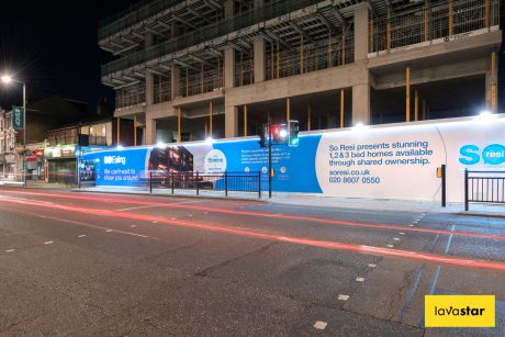 illuminated dibond hoarding at night in London