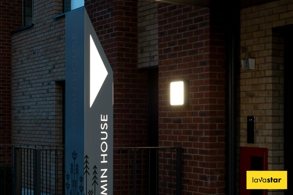 Bespoke external illuminated totem design to assist as directional signage