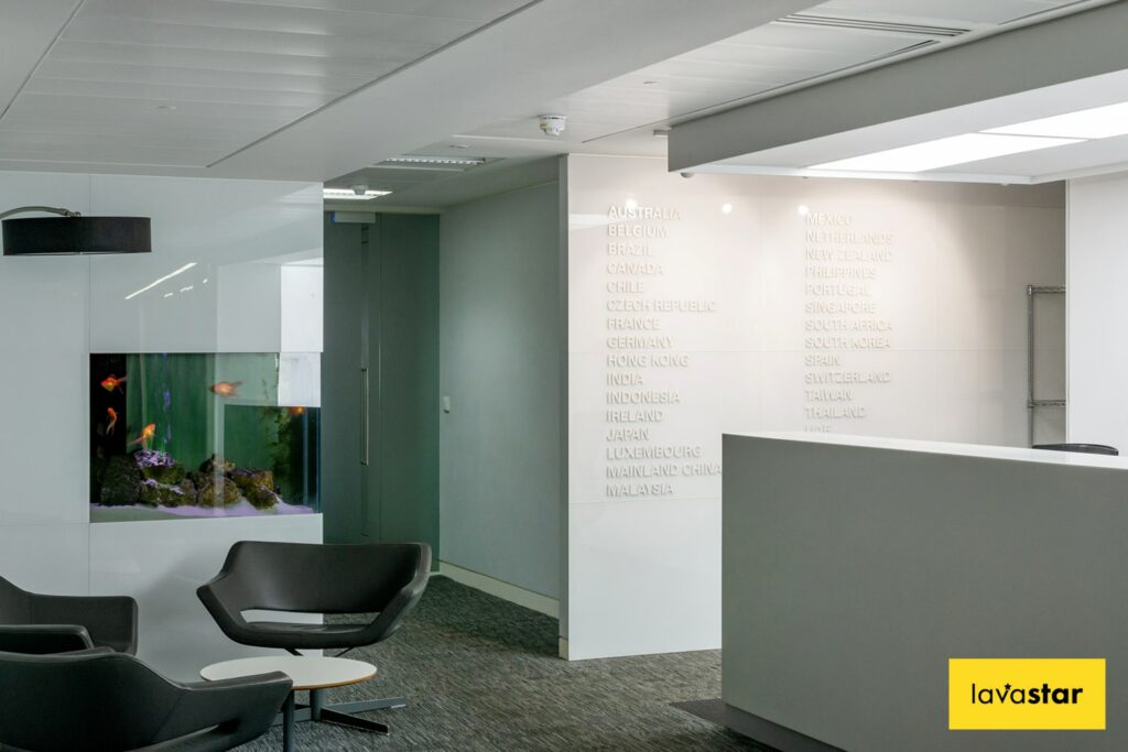 Aluminium cut lettering applied to office glass panel