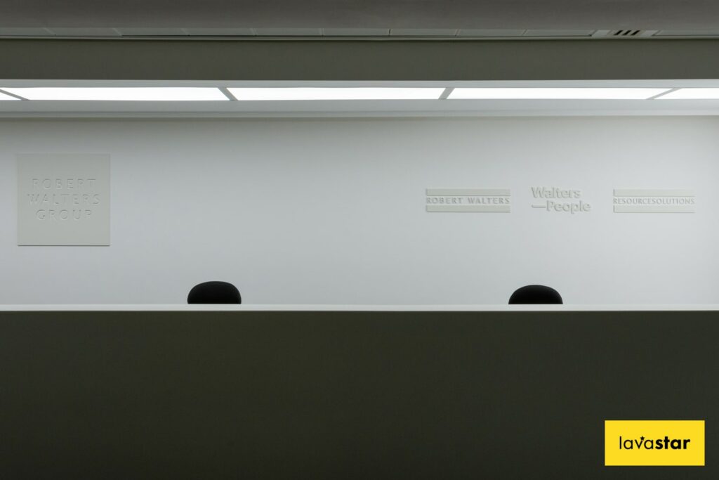 Cut lettering reception back wall signage