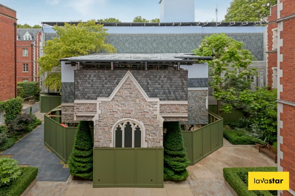 Printed building wrap graphics applied to a scaffolding in London featuring a CGI of the buildings facade