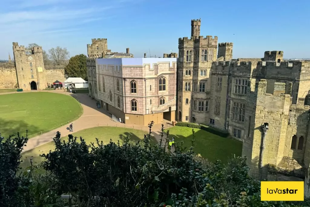 Facade replica CGI printed building wrap graphics supplied and installed at Warwick Castle by Lavastar