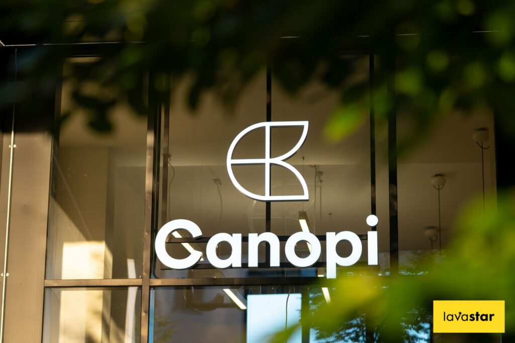 face illuminated company logo fixed to external glass