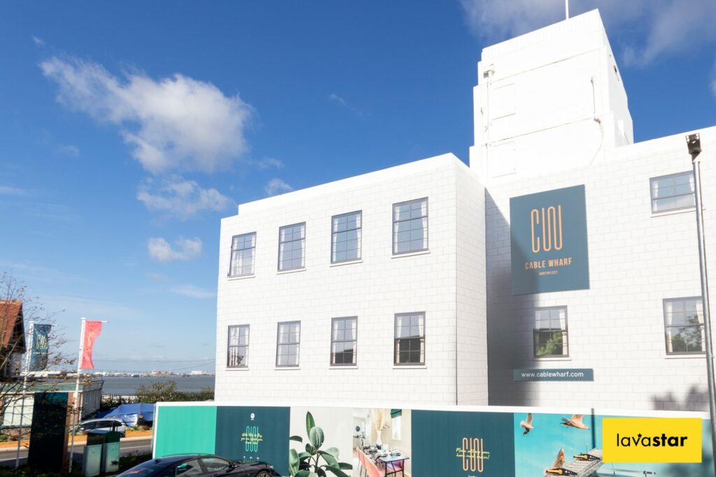 Printed building wrap without scaffolding but installed off a sub frame