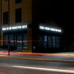 Bespoke aluminium fascia sign with built up LED illuminated lettering.