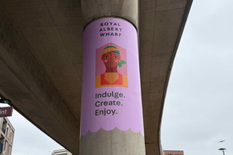 Printed vinyl on concrete pillar under bridge